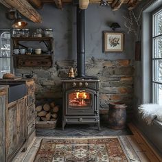 an old fashioned stove is in the corner of a room with logs and other items