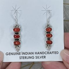 1/2 off Retail! Navajo Native American RED CORAL and Sterling Silver 3 Stone Earrings! One of a Kind Handmade Red Coral Navajo Earrings!  Beautiful and lightweight enough to wear every day!  Pair with your Navajo Pearls and other Native American jewelry. Each earring weighs approx. 2 grams.  Please review all pics and video for additional details and measurements.  Navajo Artist: Gary Shorty Retail Price:  $150.00 Our Price:  $75.00 Shipping:  FREE IMPORTANT NOTE:  See the photos to verify the s Nickel-free Southwestern Red Earrings, Southwestern Style Red Nickel-free Earrings, Nickel-free Red Southwestern Earrings, Navajo Earrings, Navajo Pearls, Native American Turquoise, Jewelry Show, American Jewelry, Native American Jewelry