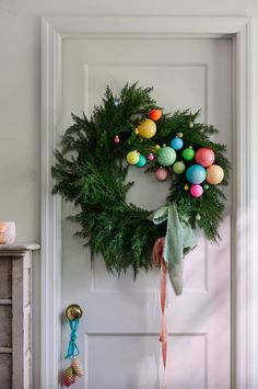 Christmas wreaths are great way to elevate your front door, entryway, or mantel during the holidays. From faux cedar and pine wrapped in velvet ribbon to a beautiful mix of dried fruit and flowers, these wreaths satisfy any holiday aesthetic and budget. To preserve your wreath outdoors, try to keep it away from direct sunlight and limit its exposure to rain, snow, whatever elements come your way. Prefer to make your own? Check out our pom pom, succulent, and holiday wreath DIYs you can make a... Cedar Wreath, Unique Holiday Decor, Tinsel Tree, Bauble Ornaments, Paper Gift Tags, Glass Bauble, All Holidays, Hand Poured Candle, Holiday Lights