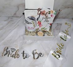 the bride to be gift box is open and ready for someone to put it in