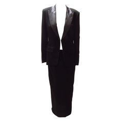 Vintage Jean Paul Gaultier black tuxedo-style dress. The skirt portion is secured with a zipper and hook & eye closure. The elegant jacket features satin cuffs and collar and two front buttons, while the back zips up to the collar's hook and eye closure. Fitted Black Skirt Suit For Business, Formal Black Fitted Skirt Suit, Black Fitted Skirt Suit For Formal Occasions, Elegant Black Skirt Suit For Formal Occasions, Elegant Black Skirt Suit For Party, Elegant Black Skirt Suit For Evening, Black Fitted Skirt Suit For Night Out, Fitted Black Skirt Suit For Night Out, Black Tuxedo Dress