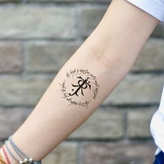 a person with a tattoo on their arm