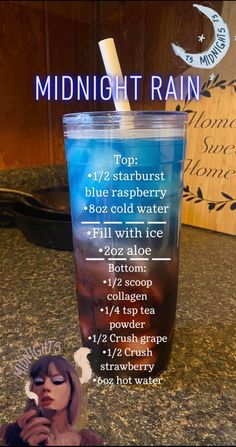 a cup that is sitting on top of a counter with information about the ingredients for midnight rain