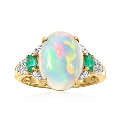 Ross-Simons - Ethiopian Opal Ring, .30ct t. w. Emeralds, .17ct t. w. Diamonds. Size 5. Our ornate ring presents a beautiful 14x10mm oval Ethiopian opal cabochon inside a shimmering halo of .17 ct. t. w. round brilliant-cut diamonds, further decorated with .30 ct. t. w. oval emeralds. Crafted in 14kt yellow gold. 1/2" wide. Opal ring. Emerald birthstones are the perfect gift for May birthdays. Ornate Ring, Emerald Birthstone, Ethiopian Opal Ring, Ring Emerald, Fine Jewelery, Yellow Gold Jewelry, Emerald Stone, Opal Ring, Jewellery Designs