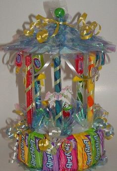 an assortment of candy and candies in a birdhouse