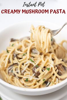 a white bowl filled with creamy mushroom pasta