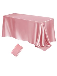 a pink table cloth and matching napkins