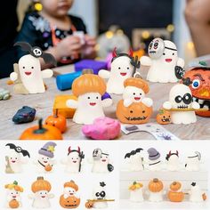 a group of halloween figurines sitting on top of a table next to each other