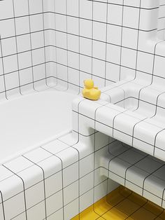 a yellow rubber duck sitting on the edge of a bathtub in a white tiled bathroom