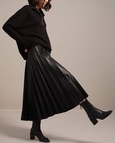 Stay fashionably chic with this pleated midi skirt. Crafted from faux leather with a side zip closure, this midi length skirt is sure to keep you looking elegant all day long! Perfect for formal events or casual nights out. Midi length skirt Faux Leather Pleated design Side zip closure Polyurethane Machine washable Size + Fit 31.5" inseam Model measurements: 5'9" tall Model is wearing a size S Style: 8040051 Long Leather Pleated Skirt Outfit, Leather Pleated Skirt Outfit, Leather Long Skirt, Long Leather Skirt, Pleated Skirt Outfit, Leather Pleated Skirt, Black Pleated Skirt, Casual Night Out, Midi Length Skirts