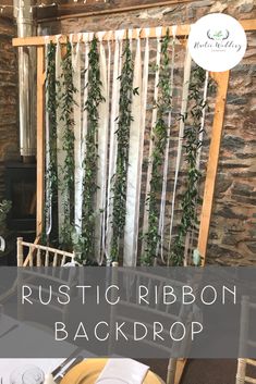 the rustic ribbon backdrop is perfect for an outdoor wedding or bridal party with greenery