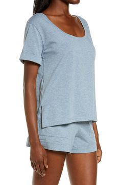 This lightweight T-shirt is made of supersoft stretch cotton in a heathered color created with plant-based dye that becomes more vibrant over time. Scoop neck Short sleeves High/low hem 91% organic cotton 9% elastane Hand wash, dry flat Imported Women's Clothing Comfortable Stretch T-shirt For Loungewear, Effortless Shirttail Hem T-shirt For Loungewear, Effortless Relaxed Fit Tops For Relaxation, Relaxed Cotton T-shirt For Casual Wear, Relaxed Cotton T-shirt, Comfortable Organic Cotton Tops For Loungewear, Comfortable Organic Cotton Loungewear Top, Soft-washed Stretch Tops For Loungewear, Relaxed Fit Shirttail Hem T-shirt For Loungewear