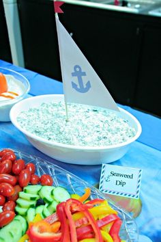 a table topped with lots of different types of food