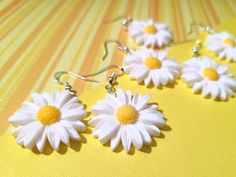 White Daisy Flower Earrings For Spring, Summer White Nickel-free Flower Earrings, White Nickel-free Flower Earrings For Summer, Cute Daisy Flower Earrings For Gift, Cute Daisy Shaped Flower Earrings For Gifts, Cute White Flower Earrings For Summer, White Daisy Flower Charm Earrings, Summer Daisy Flower Earrings Gift, Cute White Flower Earrings