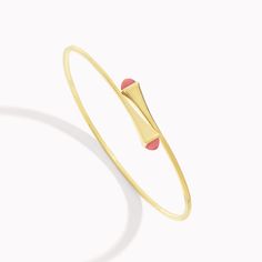 18 Karat Yellow Gold Slim Slip-On BraceletThis distinctive design features a bracelet crafted from 18K white, rose, or yellow gold, and capped with precious gemstones of your choice for a stunning look. It can be worn alone or layered with other pieces of the collection for a fashion-forward look. Cleo by Marli draws inspiration from Cleopatra, evoking her strength and power capturing enriching color and daring design. Elegant Yellow Gold Cuff Bracelet With Gemstone, Elegant Pink Gold Bangle As Gift, Adjustable Luxury Gold Bracelet With Gemstones, Adjustable Pink Gold Bracelets For Formal Occasions, Adjustable Pink Gold Bracelet For Formal Occasions, Elegant 14k Pink Gold Bracelets, Elegant Pink 14k Gold Bracelets, Luxury Gold Plated Gemstone Bracelets, Luxury Yellow Gold Bangle With Gemstone