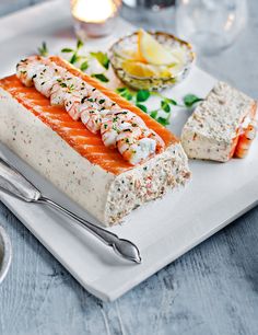 a white plate topped with food on top of a table