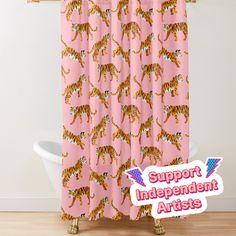 a pink shower curtain with an image of a tiger on it's face and the words support independent artists