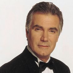 a man in a tuxedo and bow tie