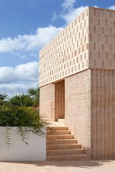 a brick building with steps leading up to it