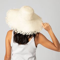 Frayed edges are a classic way to show off your personality without compromising a natural aesthetic. Featuring a 4.5" brim and classic round crown, this hat is perfect for warm weather outings to the beach, park, or pool. 100% straw 4.5" brim Women's One Size Adjustable Lightweight Hats With Curved Brim For Sunbathing, Lightweight Curved Brim Hat For Sunbathing, Upf 50+ Wide Brim Panama Hat, Lightweight Curved Brim Sun Hat, One Size, Upf 50+ Brimmed Panama Hat One Size, Upf 50+ Brimmed Panama Hat, Kentucky Derby Lightweight Wide Brim Hat, Uv Protection Panama Hat With Curved Brim, Lightweight Flat Brim Sun Hat For Kentucky Derby