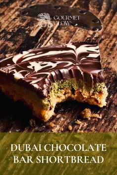 slice of a pie made of pastry, green cream and dark chocolate layer Halloween Pastry Desserts, Viral Cookies, Dubai Chocolate Cookie, Kataifi Dessert, Dubai Chocolate Cake, Dubai Sweets, Cranberry And Pistachio Shortbread, Dubai Chocolate Bar Recipe, Restaurant Startup