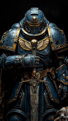 a blue and gold painted warhammer standing with his hands on his hips