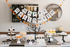 a halloween party with black and white decorations