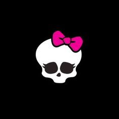 a skull with a pink bow on it's head is shown in the dark