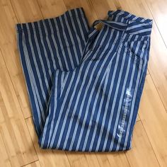 New Without Tags American Eagle Outfitters Blue Stripe Wide Leg Pants Size 2 Regular High Rise 100% Cotton 14.5” Across The Front 30” Inseam 39.5” Length Questions? Leave A Comment Below! High Rise Blue Pants For Day Out, Tie Pants, Striped Wide Leg Pants, Blue Stripes, Leg Pants, Wide Leg Pants, Pant Jumpsuit, American Eagle Outfitters, American Eagle