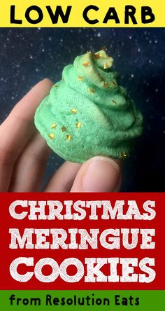 christmas meringue cookies from resolution eats by low carb book cover with hand holding green frosted cookie