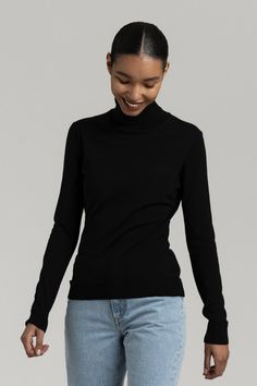 The Merino Turtleneck in Black: Indisputable staple in any woman's wardrobe. Made from 100% extra-fine merino wool Turtleneck Sweater Outfit, Women's Wardrobe Essentials, Womens Wardrobe, Winter Sweater Outfits, Black Turtleneck, Merino Wool Sweater, Cashmere Wool, Mock Neck Sweater, Women's Wardrobe