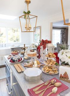 a kitchen counter topped with lots of food