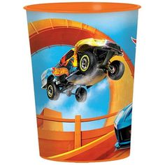 an orange cup with a monster truck on it