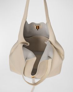 Rebecca Minkoff "Darren" tote bag in leather     Shoulder straps, 12" drop    Open top with turnlock closure and side snap closure     Interior, one slip pocket     Approx. 15.5"H x 16"W x 5.5"D    Item Weight (Lbs.): 2.0    Imported Cult Gaia Bag, Tods Bag, Woven Leather Tote, Luxe Style, Adjustable Bag, Rebecca Minkoff Bag, Raffia Bag, Marc Jacobs Bag, Eyewear Womens