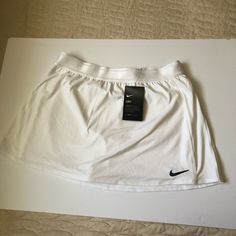 White Nike Large Athletic Skirt Built In Shorts Underneath. Thank You For Looking! Very Cute! Length Laying Flat: 13 Inches Waist Laing Flat: 15 Inches Waist Is Elastic 19 Nike White Fitted Tennis Skirt, Fitted White Nike Tennis Skirt, Nike Sporty White Skirt, Nike White Tennis Skirt For Spring, Nike White Casual Skort, Nike Stretch Lined Tennis Skirt, Stretch Nike Tennis Skirt, Nike Stretch Tennis Skirt, Nike Stretch Tennis Skirt With Lining