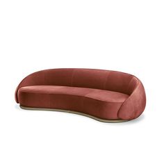 an oval shaped couch with a curved back and foot rest in red velvet, against a white background