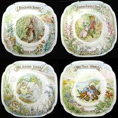 four plates with peter rabbit designs on them