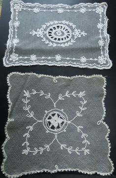 two pieces of cloth with white lace on them