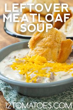 a bowl of leftover meatloaf soup with bread and cheese on the side