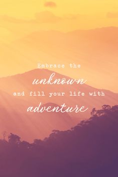 the words embrace the unknown and fill your life with adventure on top of a mountain