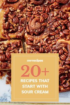 some pecans are sitting on top of a table with text overlay that reads 20 recipes that start with sour cream