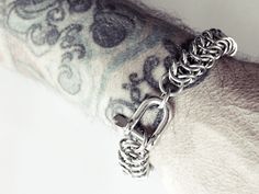 This bracelet is hand woven link by link. It is made using the finest stainless steel we can get our hands on and finished with top quality clasps. Heavy duty and built to last, this chain will not rust or fall apart. Now available with your choice of clasp. *16 gauge stainless steel chain in King's Link weave *Top quality clasps are very secure *Small fits wrists up to 6.5 inches (16.5 cm) *Medium fits wrists up to 7.5 inches (19 cm) *Large fits wrists up to 8.5 inches (21.5 cm) We do not measu Jewelry For Him, Wallet Chains, Chainmail Bracelet, Large Man, Metal Bracelet, Mens Bracelet Silver, Bracelet Mens, Metal Bracelets, Steel Jewelry