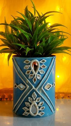 a potted plant sitting on top of a table