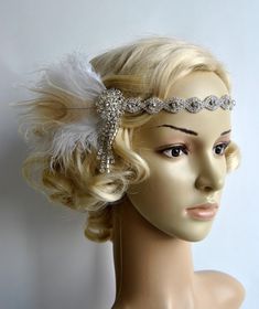 Beautiful Vintage Style flapper headband. Perfect for a vintage inspired bride, 1920's wedding or Great Gatsby party. Lovely stunning rustic hair piece - Vintage inspired - stylish with modern look! Made of : - hight sparke rhinestone headband - a spray of ostrich feathers and hand curles peacock eye - embellished with sparkling Art Deco rhinestone brooch and rhinestone dangling drop Can be worn with feathers on the right side of head, it ties on with satin ribbons. Can be put down on the forehe Gatsby Style Headband For Vintage Events, Adjustable Feather Headpiece For Vintage Events, Gatsby Style Feather Headpieces For Vintage Events, Gatsby Style Fascinator For Vintage Events, Adjustable Gatsby Style Fascinator For Vintage Events, Silver Gatsby Style Wedding Headpieces, Vintage Wedding Fascinator With Feathers, Gatsby Style Wedding Headband, Adjustable Feather Hair Accessories For Wedding