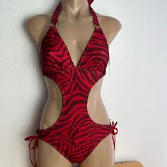 New With Tags Removed Cups Red Lined Swimwear For Summer, Red Halter Neck Bodysuit For Vacation, Lined Red Swimwear For Beach Season, Red Lined Swimwear For Beach Season, Red One-piece Swimwear With Lined Body For Beach, Red Lined Swimwear For Vacation, Red Lined One-piece Swimsuit For Beach, Red Halter Neck Bodysuit, Red Halter Neck Bodysuit With Lined Body