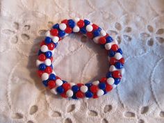 This is a Girls Beaded Bracelet.  It has red, white, and blue tri beads. It was made with .8mm sturdy stretch string. I tie it several times to prevent breakage. It fits girls ages 4-6. It stretches to fit the wrist. It would make a cute gift for a little girl for the Fourth of July. It would make a cute gift for a little girl's Birthday. All items are ready to be shipped I do combined shipping. Items ship in 2-5 business days. Check out more items at: http://www.etsy.com/shop/MesheleCrafts http Patriotic White Stretch Bracelet With Round Beads, Patriotic White Stretch Bracelet, Bracelets Kids, Patriotic Bracelet, Angel Bracelet, Kids Bracelets, The Fourth Of July, Bone Beads, Red White And Blue