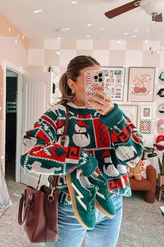 Winter outfit idea, 90s mom aesthetic, ugly Christmas sweater outfit! Festive ootd 🎄🎅🏼❄️ sizing: 👇🏻👇🏻 Sweater: 2xl  (for an oversized look) Jeans: 28 long White t: M Shoe: 7 run true to size   Follow my shop @cassscroggins on the @shop.LTK app to shop this post and get my exclusive app-only content!  #liketkit #LTKFindsUnder50 #LTKSeasonal #LTKHoliday @shop.ltk https://liketk.it/4XhVo Casual Christmas Sweater Outfits, Ugly Christmas Outfit Ideas, 90s Mom Aesthetic, 90s Christmas Aesthetic, Holiday Sweater Outfit, Ugly Sweater Outfit, Ugly Sweater Outfits, Ugly Christmas Outfit, Christmas Sweater Outfit