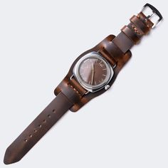 "WW2 Military Pilot Bund Strap - Antique Brown FEATURES -Compatible with all watches between 18mm and 24mm lug width. -Single layer -Standard Length: 80mm/125mm - 3.1\"/ 4.9\" -Thickness: 1.6-1.8mm -316L Stainless steel buckle included. -Durable waxed thread -Handmade and hand stitched *Measure the buckle and lug width (the width between the area where your watch strap fits) and select the right size. *When that extra piece-bund is removed, the strap becomes classic two-piece strap. *It might be Wooden Watches For Men, Watch Engraving, Pilot Watch, Classic Bracelets, Military Watches, Wooden Watch, Leather Watch Bands, Classic Watches, Leather Watch Strap