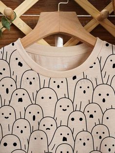 Casual Long Sleeve Cartoon Print T-shirt, Trendy Cartoon Print Tops For Fall, Oversized Long Sleeve T-shirt With Cartoon Print, Oversized Long Sleeve Top With Funny Print, Fall Long Sleeve Tops With Funny Print, Beige Long Sleeve T-shirt With Graphic Print, Beige Long Sleeve Tops With Graphic Print, Fall Cartoon Print Tops For Loungewear, Casual Tops With Cartoon Print For Loungewear