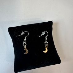 This Is A Hand Assembled Dainty Moon Earring. It Is Simplistic And Comfortable. These Earrings Could Go With Almost Anything. They Are Comfortable On The Ear If You Are Intending To Wear Them For A Prolonged Period Of Time. Bundles And Reasonable Offers Are Welcome! Minimal, Metallic, Shiny, Pretty, Elegant, Cute, Cutesy, Feminine, Gold, Dainty Dangly, Girly, Amazing, Fun, Stars, Star, Starry, Space, Moons, Moon, Half-Moon, Waning Crescent, Crescent, Night Sky, Night, Handmade, Handcrafted, Casu Pandora Pearl, Moon Half, Waning Crescent, Moon Earring, Half Moon Earrings, Sky Night, Heart Hoop Earrings, Halo Earrings Studs, Pearl Hoop Earrings